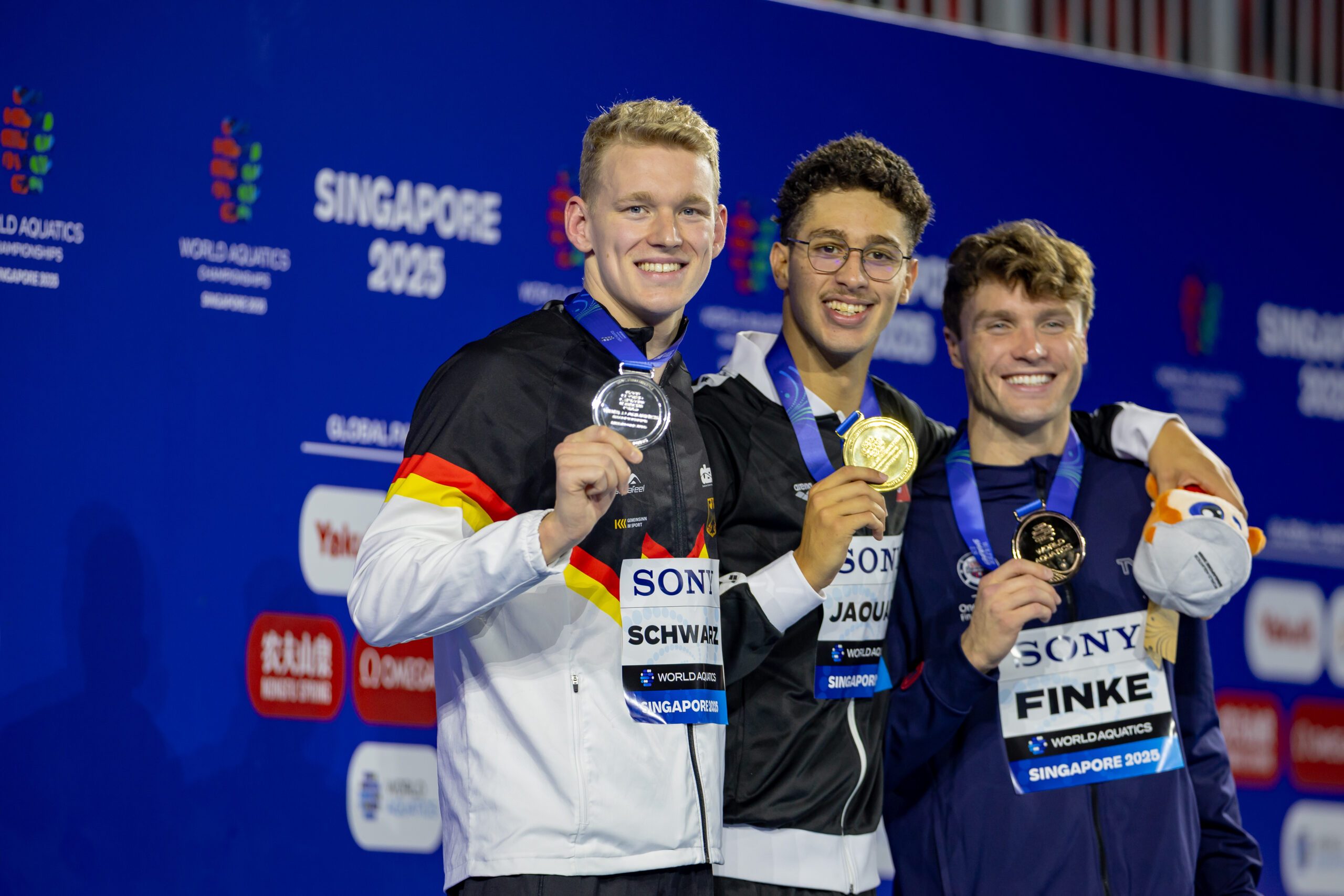 World Championships Arena, Singapur 3.8.2025: World Aquatics Championships Singapur 2025 - Schwimmen Finals Tag 8, Sven Schwarz, Ahmed Jaouadi, Bobby Finke (Photo by JoKleindl)